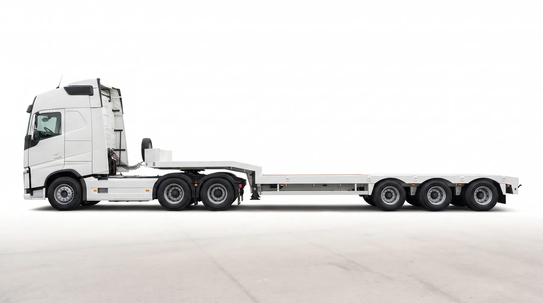 White three-axle lowbed trailer from the Decent Way fleet