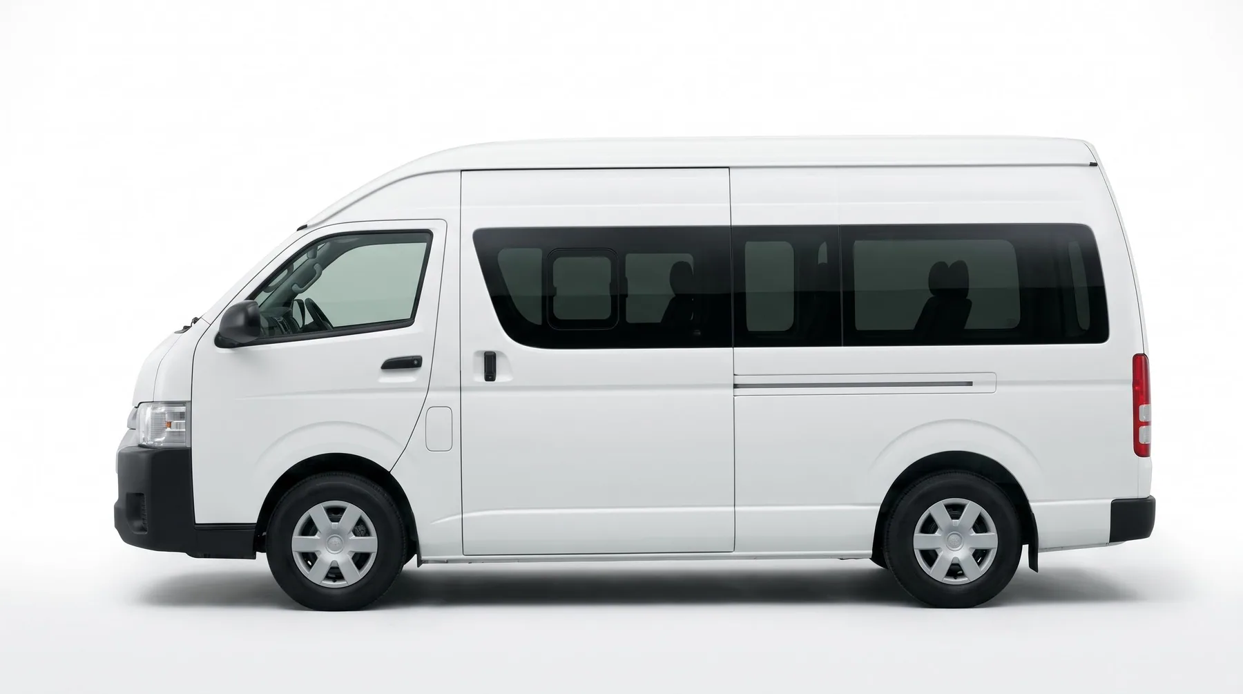 White 15-seater passenger van from the Decent Way fleet