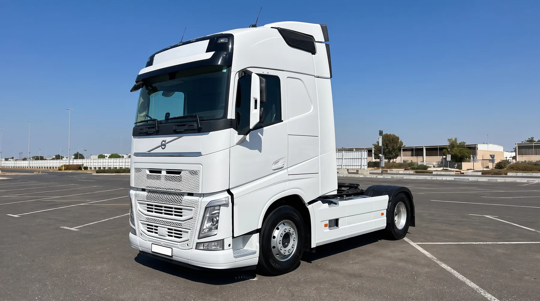 White Volvo prime mover supplied with an experienced driver